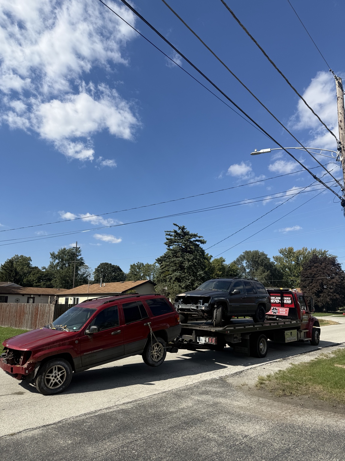 Two Jeep SUVs transported by Innergee