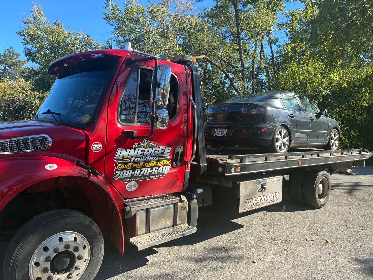 Mazda sedan on the Innergee flatbed