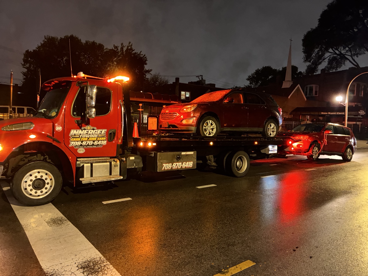 Chevrolet SUV pickup on a rainy evening