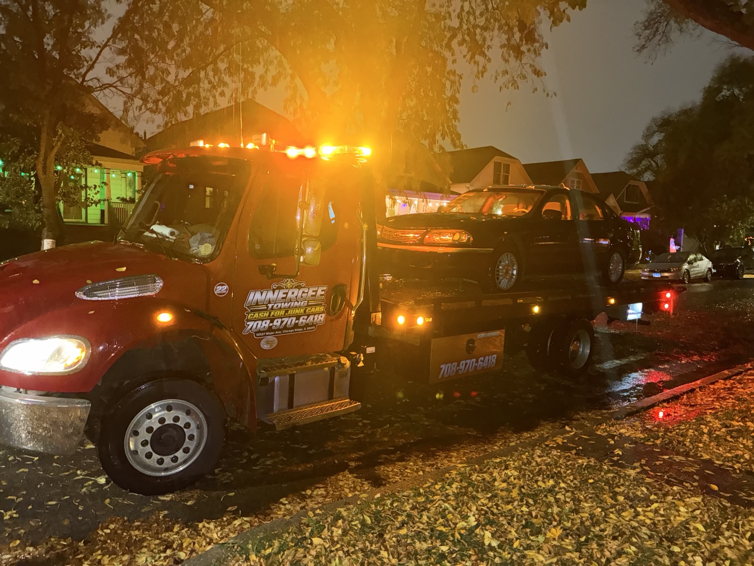 Sedan on the Innergee truck at night